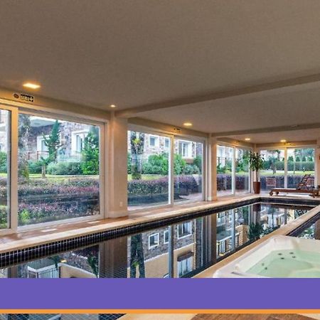 Rosa Edificio Casa De Pedra Leilighet Gramado Eksteriør bilde